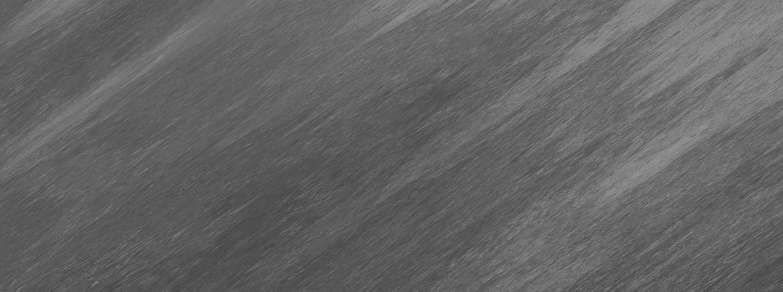 Abstract gray texture with diagonal lines.