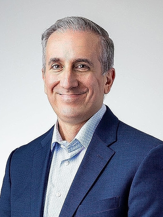 Smiling man in business suit portrait.