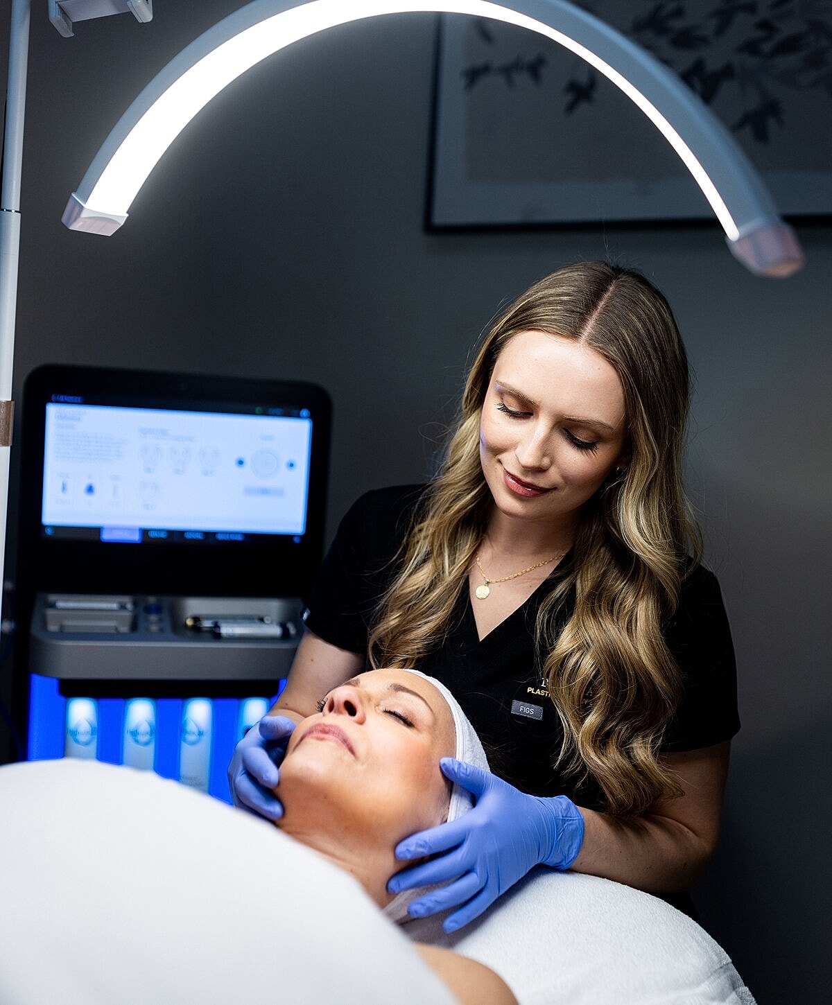 Facial treatment in a skincare clinic setting.