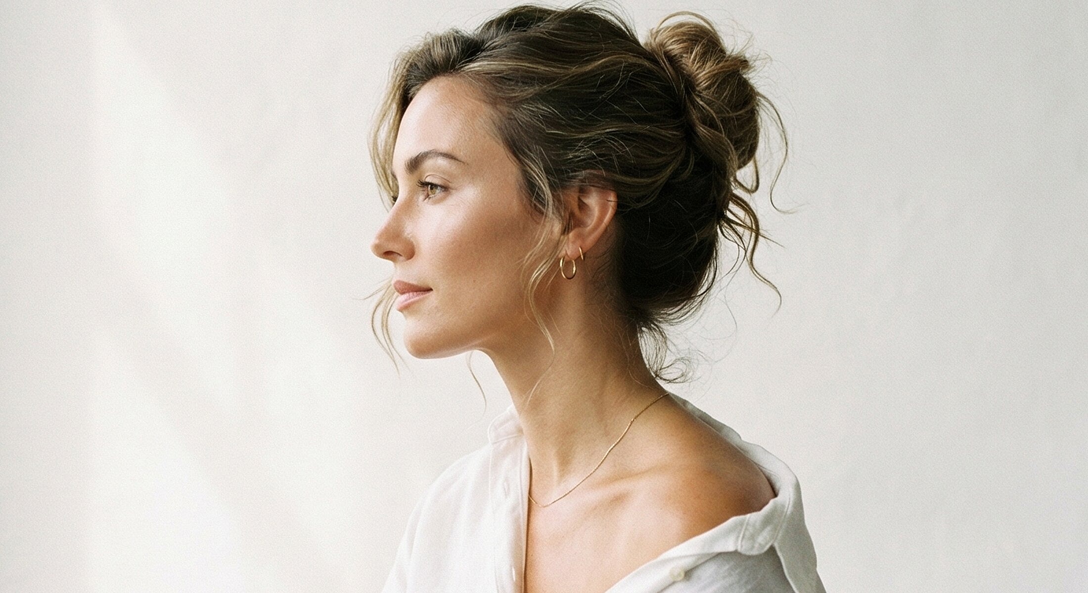 Profile of a woman with natural makeup.