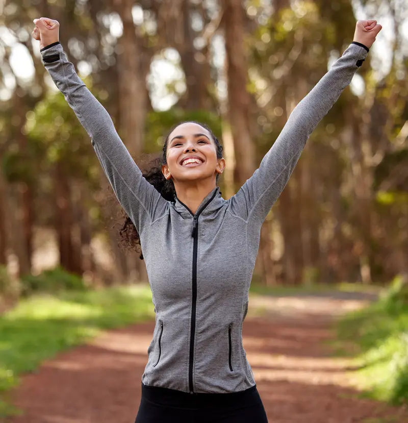 Confident jogging woman post tummy tuck